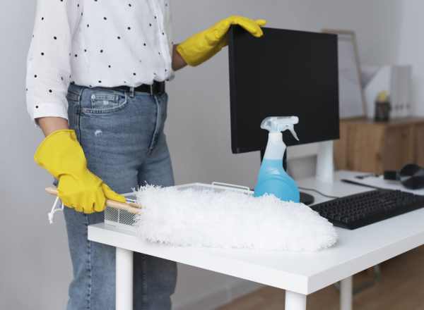 person-taking-care-office-cleaning-scaled (1)